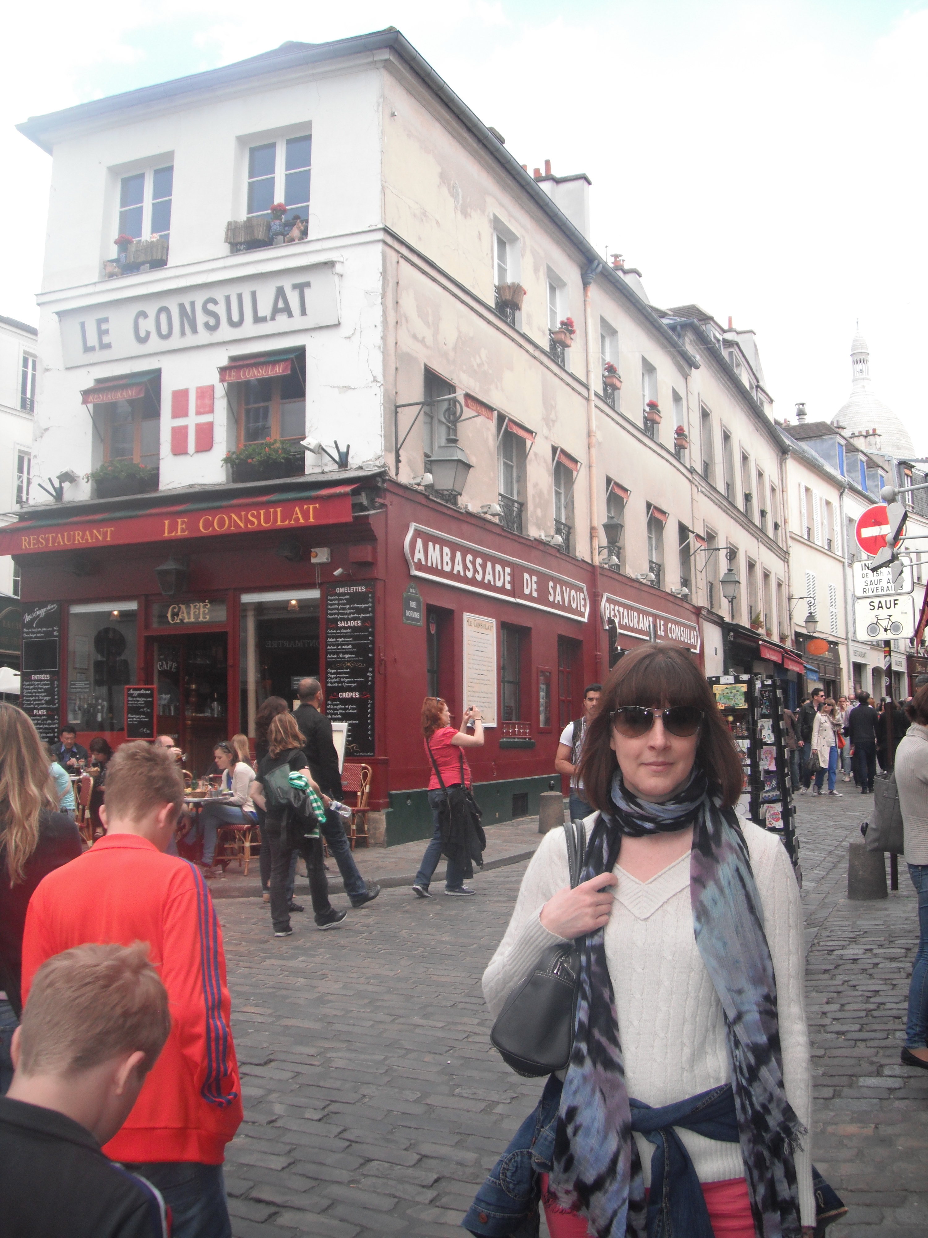 This is me in Montmartre where the Sacre Coeur church is. Notice how I'm clutching my bag. The area is well known for pickpockets!