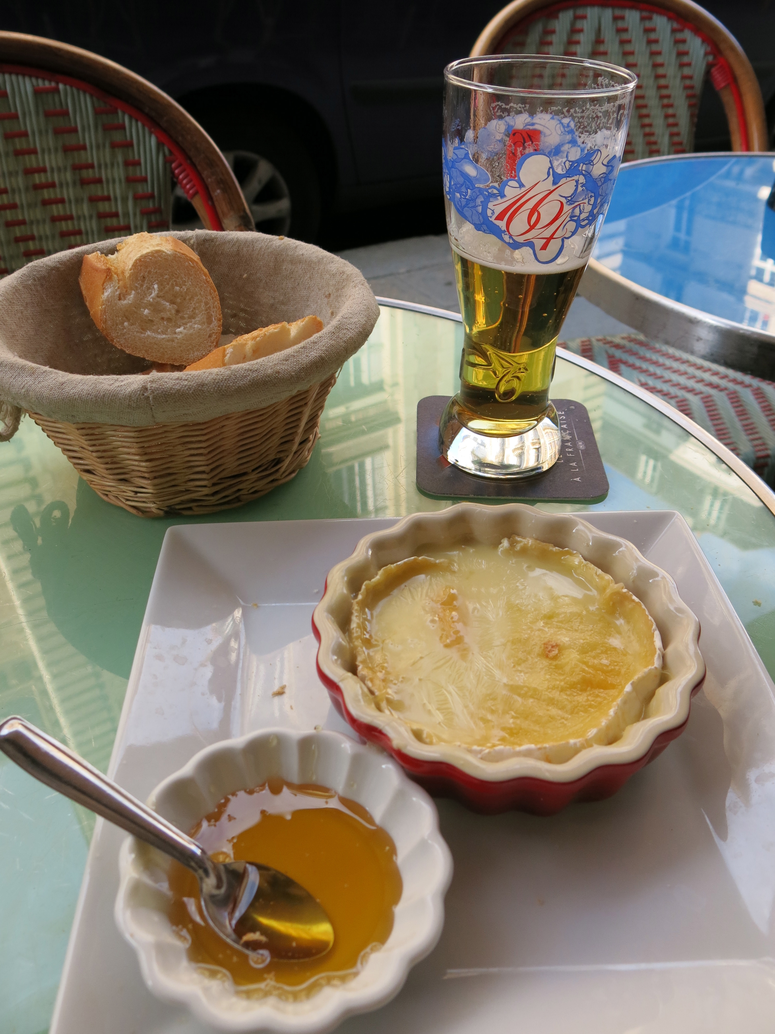 A pre-dinner appetizer: Camembert cheese baked until melted. Delish! Seems like it would be easy to prepare at home. I'll let you know!